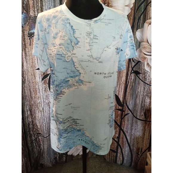 Exclusive Tops - Exclusive Tee North Atlantic Ocean," "Brazil," and "Labrador Sea"